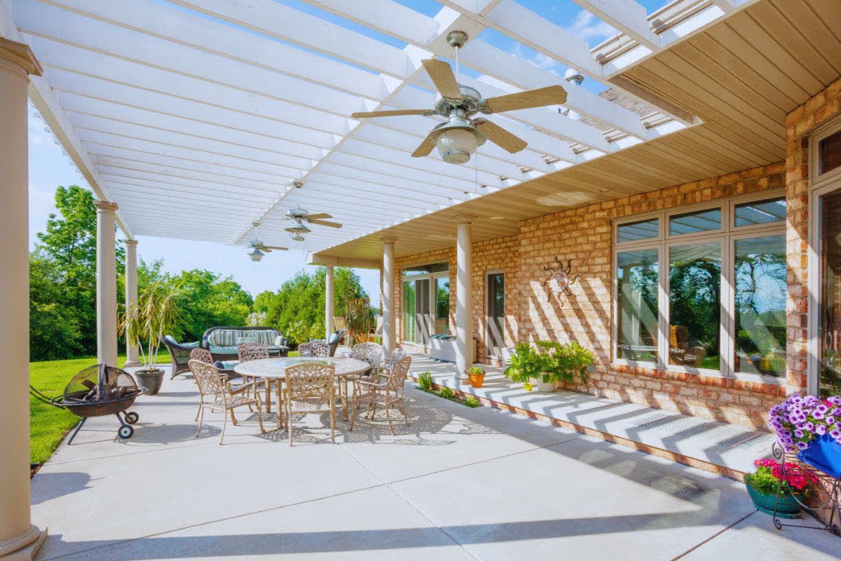 Concrete patio poured beside an outdoor entertaining area