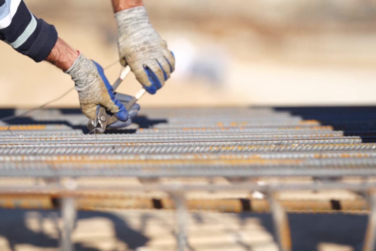 Steel reinforcement mesh being tied before a concrete pour